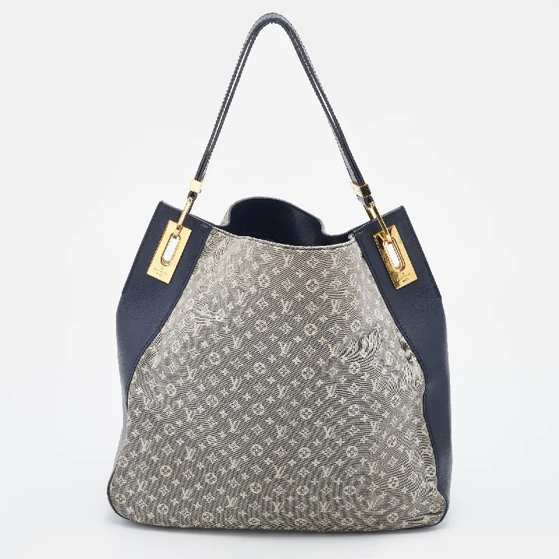 Louis Vuitton bags with a chain - link trim and a leather body for a modern edgeLouis Vuitton Encre Monogram Idylle Rendez-vous MM Bag