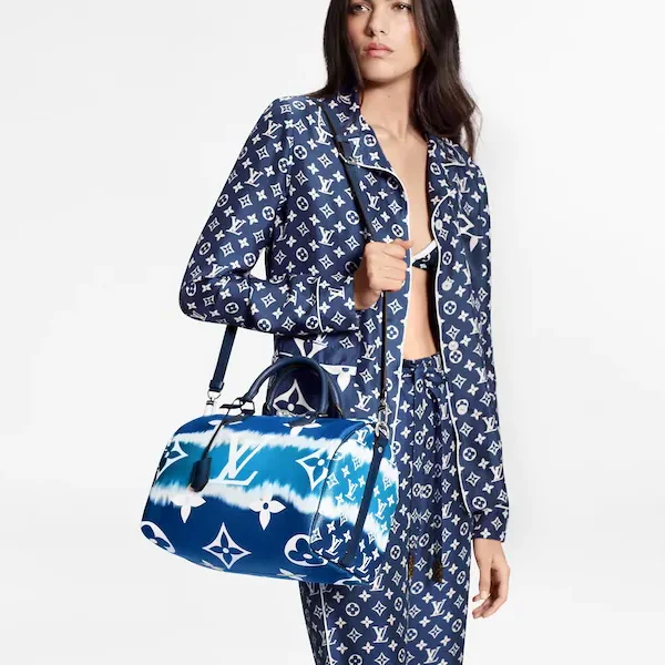 Louis Vuitton bags with a chain - link trim and a leather body for a modern edgeLouis Vuitton Escale Speedy Bandouliere 30 Bleu