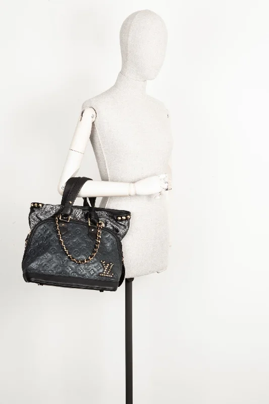 Louis Vuitton bags with a chain - link trim and a leather body for a modern edgeLOUIS VUITTON Double Jeu Neo Alma MNG Empreinte Blue