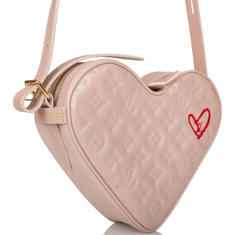 Louis Vuitton bags with a chain - link trim and a leather body for a modern edgeLouis Vuitton Fall In Love Heart Bag Embossed Monogram Light Pink Lambskin