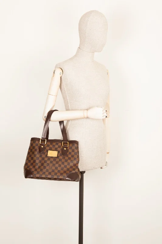 Louis Vuitton bags with a chain - link trim and a leather body for a modern edgeLOUIS VUITTON Hampstead Bag PM Damier Ebene