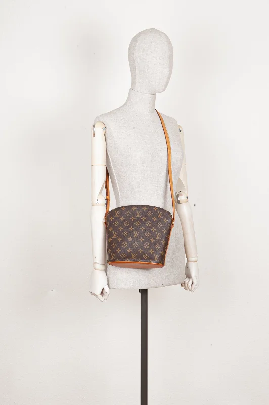 Louis Vuitton bags with a chain - link trim and a leather body for a modern edgeLOUIS VUITTON Drouot MNG