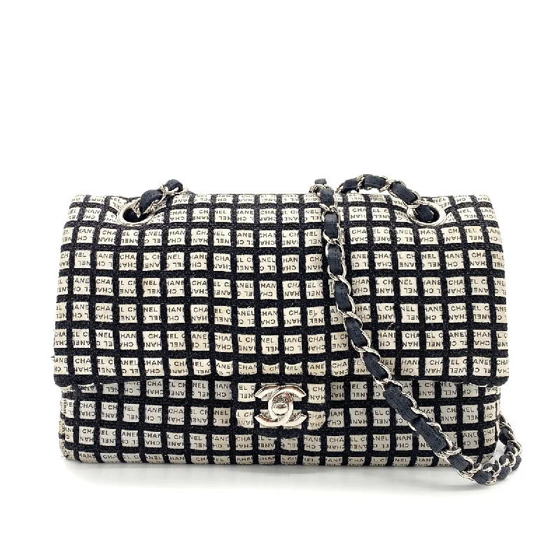 Chanel Vintage Inspired Handbag for Retro LoversCHANEL CHAIN SHOULDER BAG BLACK WHITE CANVAS 90256928