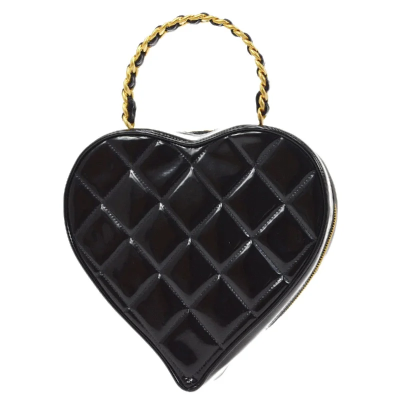 Chanel Limited Edition Handbag for CollectorsCHANEL * 1995 Black Patent Leather Heart vanity bag