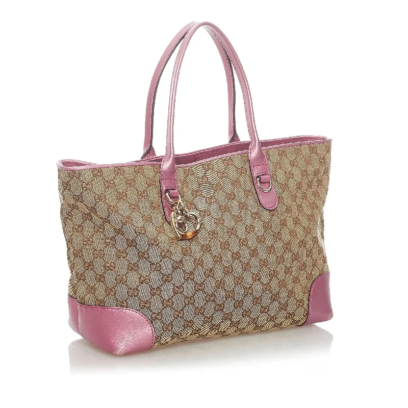 Women Gucci crossbody bags with a printed floral patternGucci GG Canvas Heart Bit Tote Bag (32999)