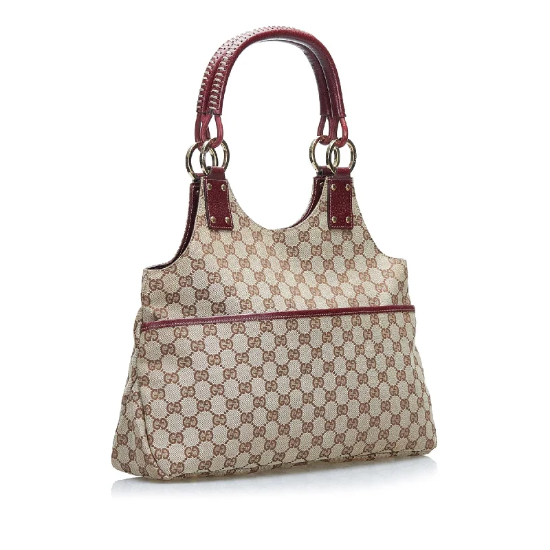 Women Gucci Sylvie bags with a monogram - embossed leatherGucci GG Canvas Handbag (z4RIcc)