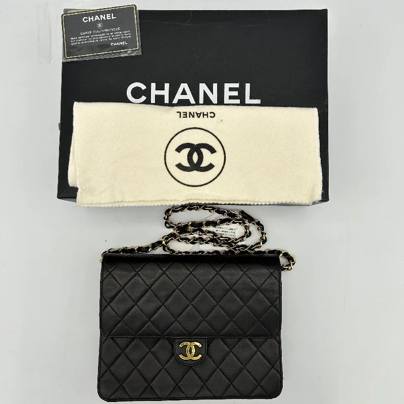 Chanel Quilted Leather Shoulder Bag for FashionistasChanel Black Lambskin Pushlock Small Half Flap Shoulder Bag 1996-1997