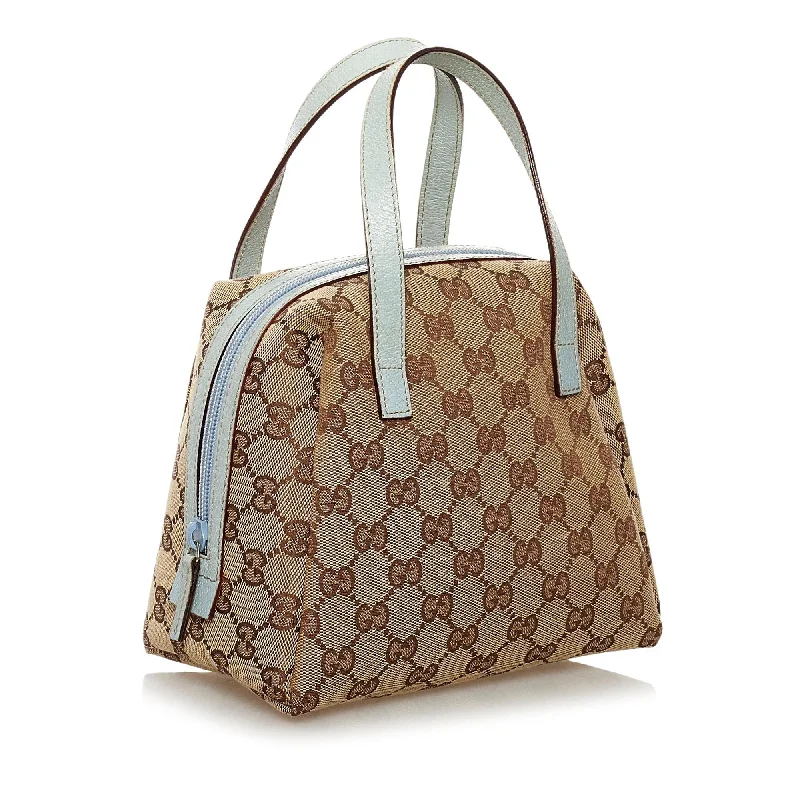 Gucci backpacks for women with a hidden back pocketGucci GG Canvas Handbag (34699)