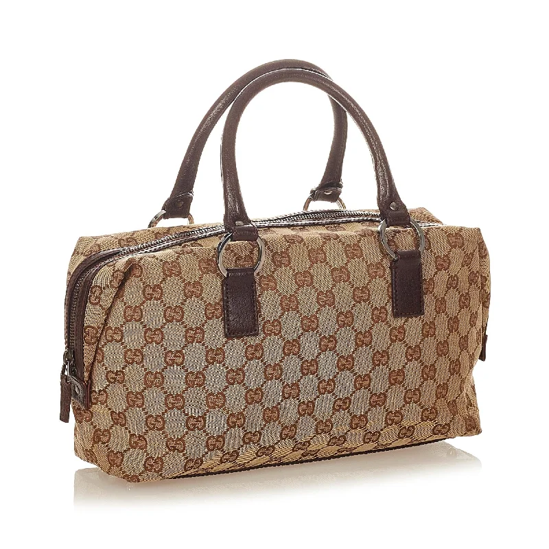 Gucci Marmont bags for women with gold - toned hardwareGucci GG Canvas Handbag (24436)