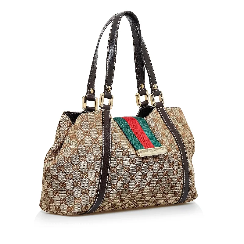 Women Gucci Sylvie bags with a monogram - embossed leatherGucci GG Canvas New Ladies Web Tote (SHG-nXYCc6)