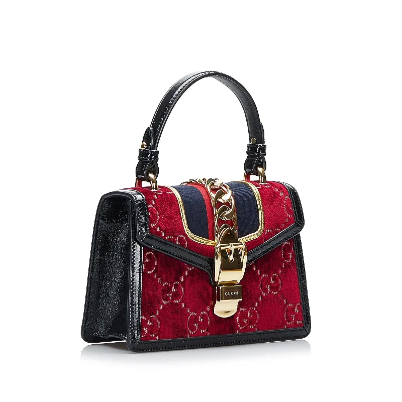 Gucci backpacks for women with a sleek silhouetteGucci Mini GG Velvet Sylvie Satchel (SHG-DMuxoM)