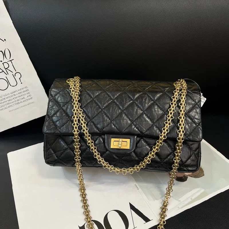 Chanel Limited Edition Handbag for CollectorsChanel 2.55 Black Gold Crinkled Cowhide Shoulder Bag 28