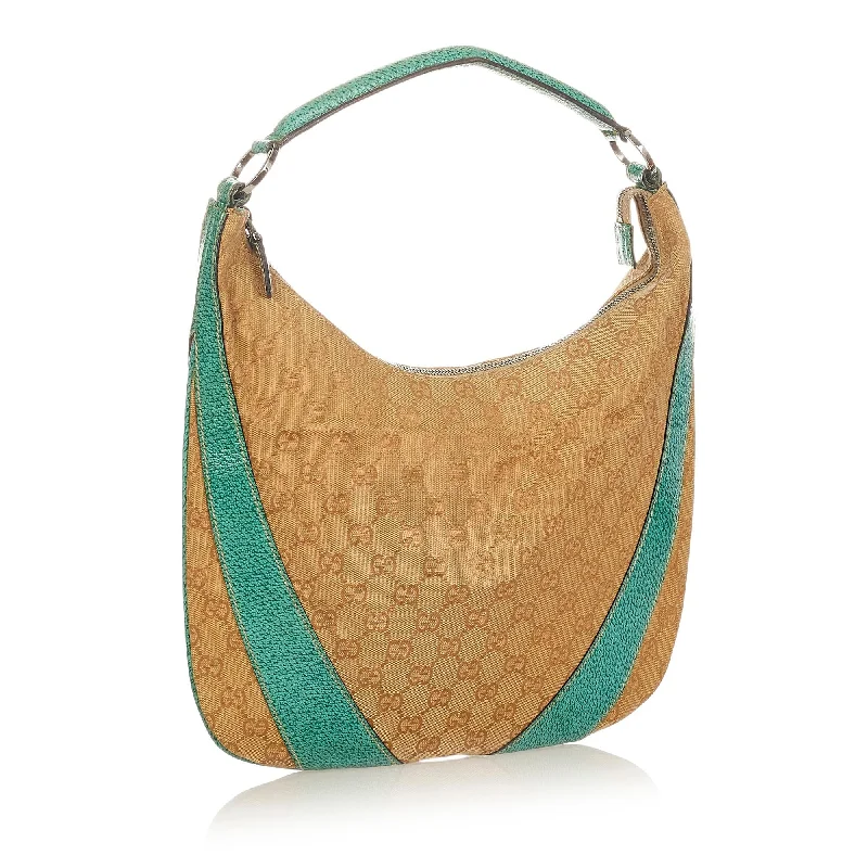 Gucci Marmont bags for women with a contrast - colored interiorGucci GG Canvas Shoulder Bag (SHG-lRiQLU)