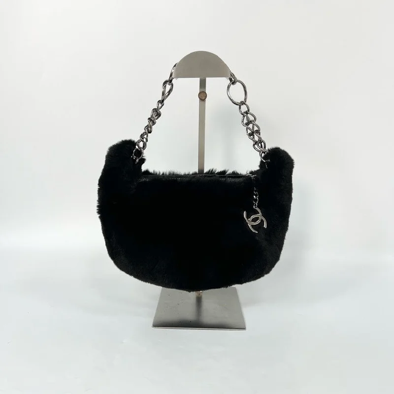 Chanel Vintage Inspired Handbag for Retro LoversChanel Black Faux Fur Hobo Bag Silver Chain 27x18cm