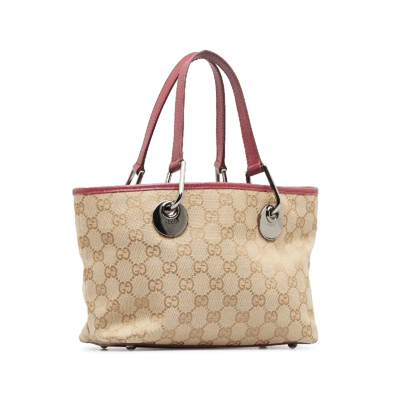 Women Gucci bags with a front - zip pocket for small itemsGucci Mini GG Canvas Eclipse Handbag (SHG-Y0vQ9a)