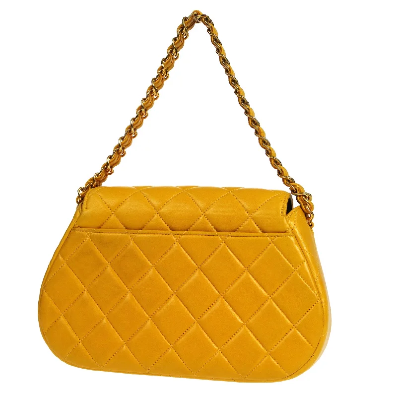 Chanel Quilted Leather Shoulder Bag for FashionistasCHANEL 1996-1997 Round Flap Handbag Orange Lambskin 26418