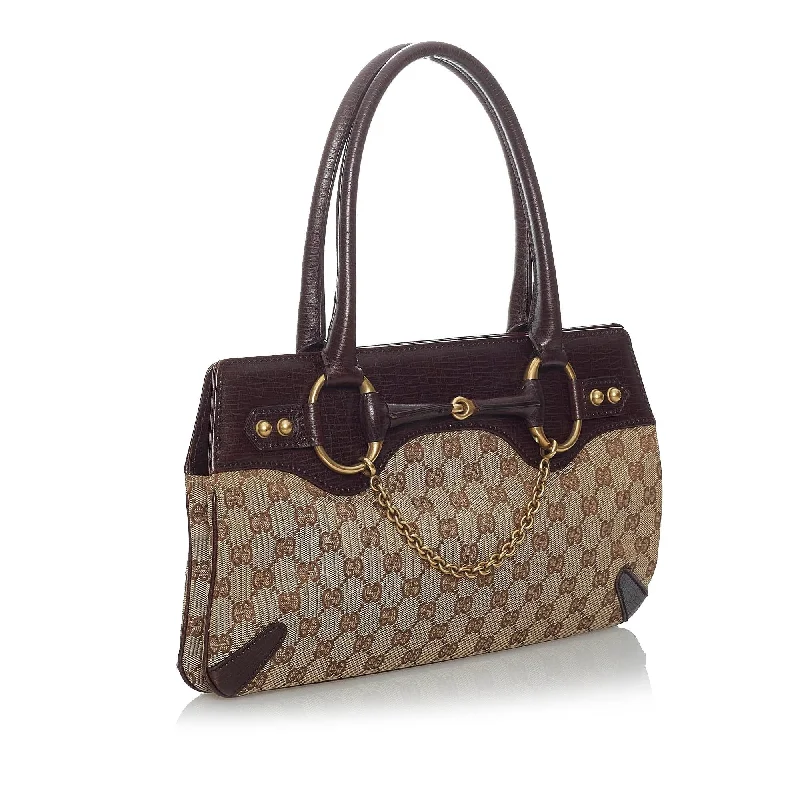 Women Gucci bags with interlocking G hardware for a classic lookGucci GG Canvas Horsebit Handbag (29601)