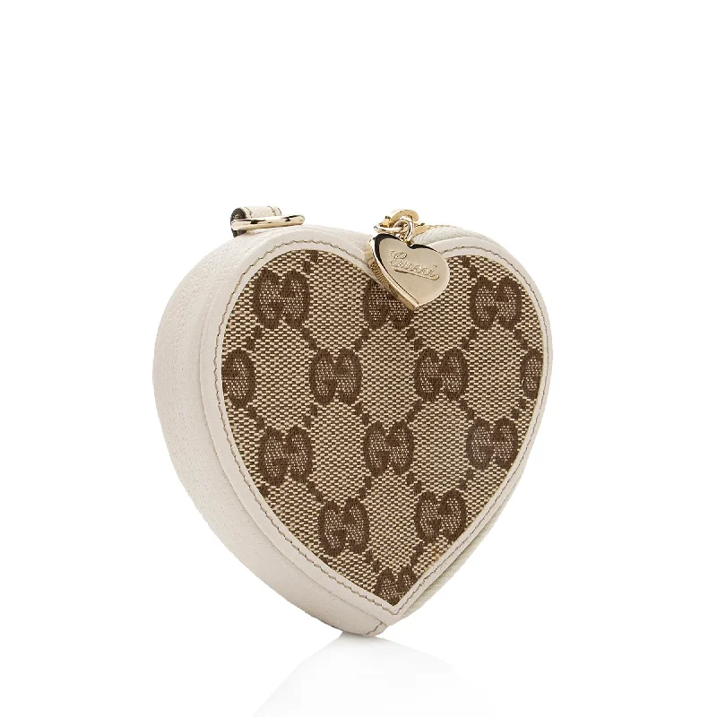 Women Gucci bags with a zippered interior pocketGucci GG Canvas Heart Coin Pouch (SHF-8ldoVR)