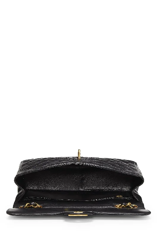 Chanel All - Match Handbag for Versatile StylingChanel,  Black Quilted Lambskin Half Flap Jumbo, Black