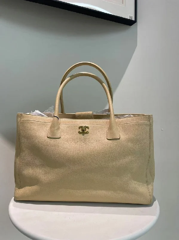 Chanel Designer Handbag with Unique DesignChanel Beige Leather Caviar Grand Shopping Tote Bag