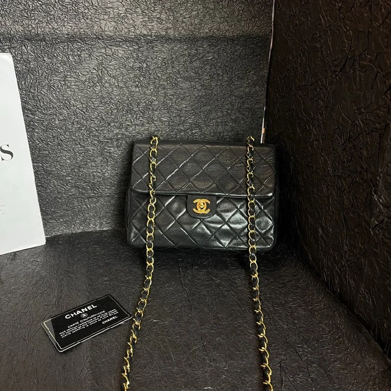 Chanel Handbag with Adjustable Strap for ComfortChanel Black Gold Quilted Large Square Shoulder Bag 20cm